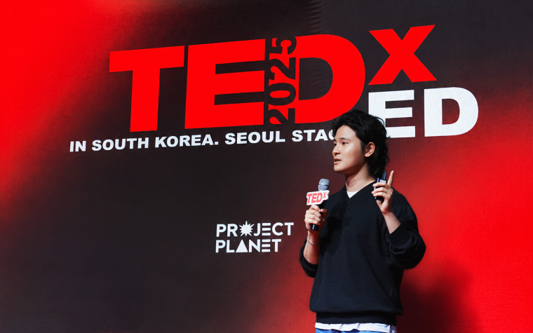 Speaking on the TEDxED stage